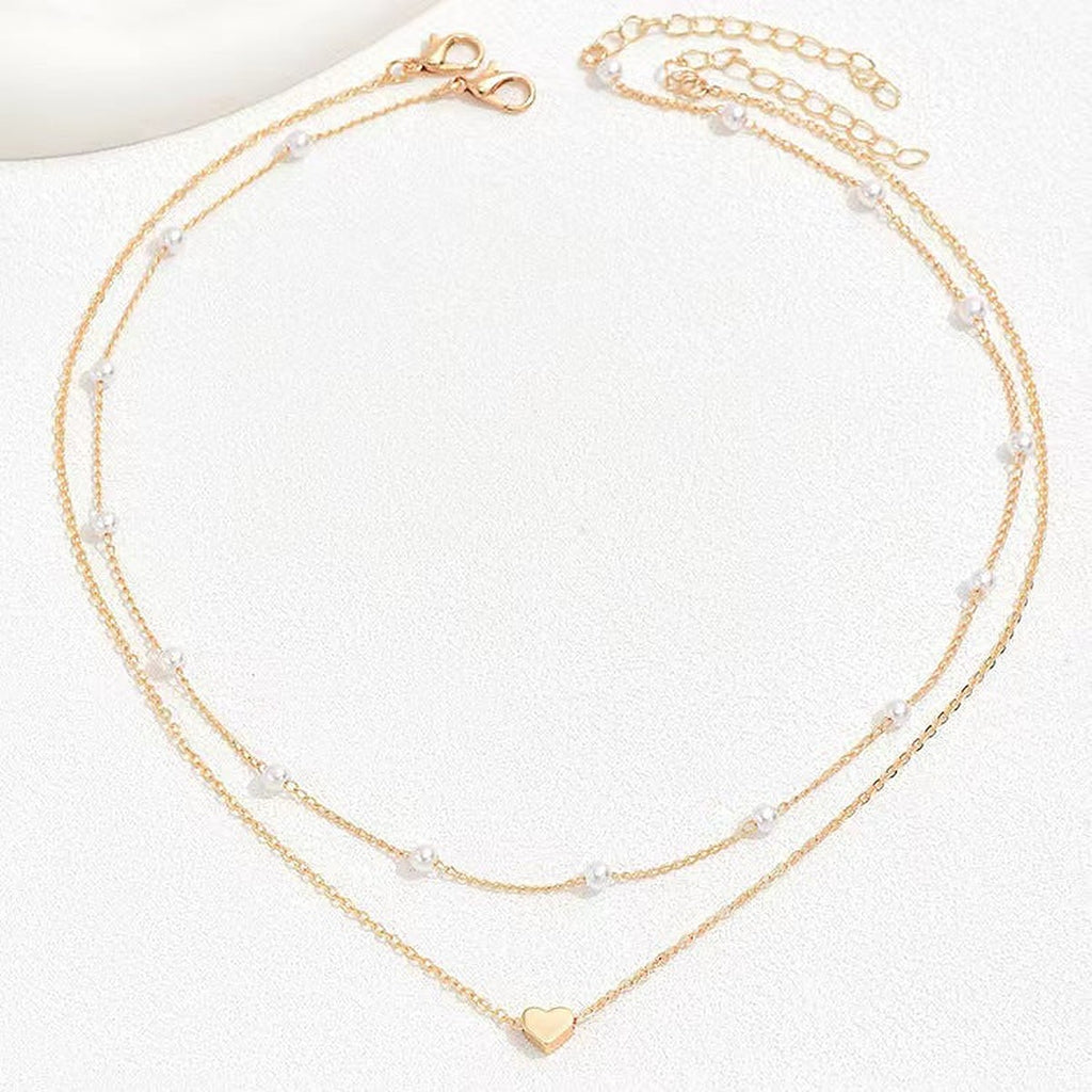 Collar Doble de Perlas con Corazón – Dorado
