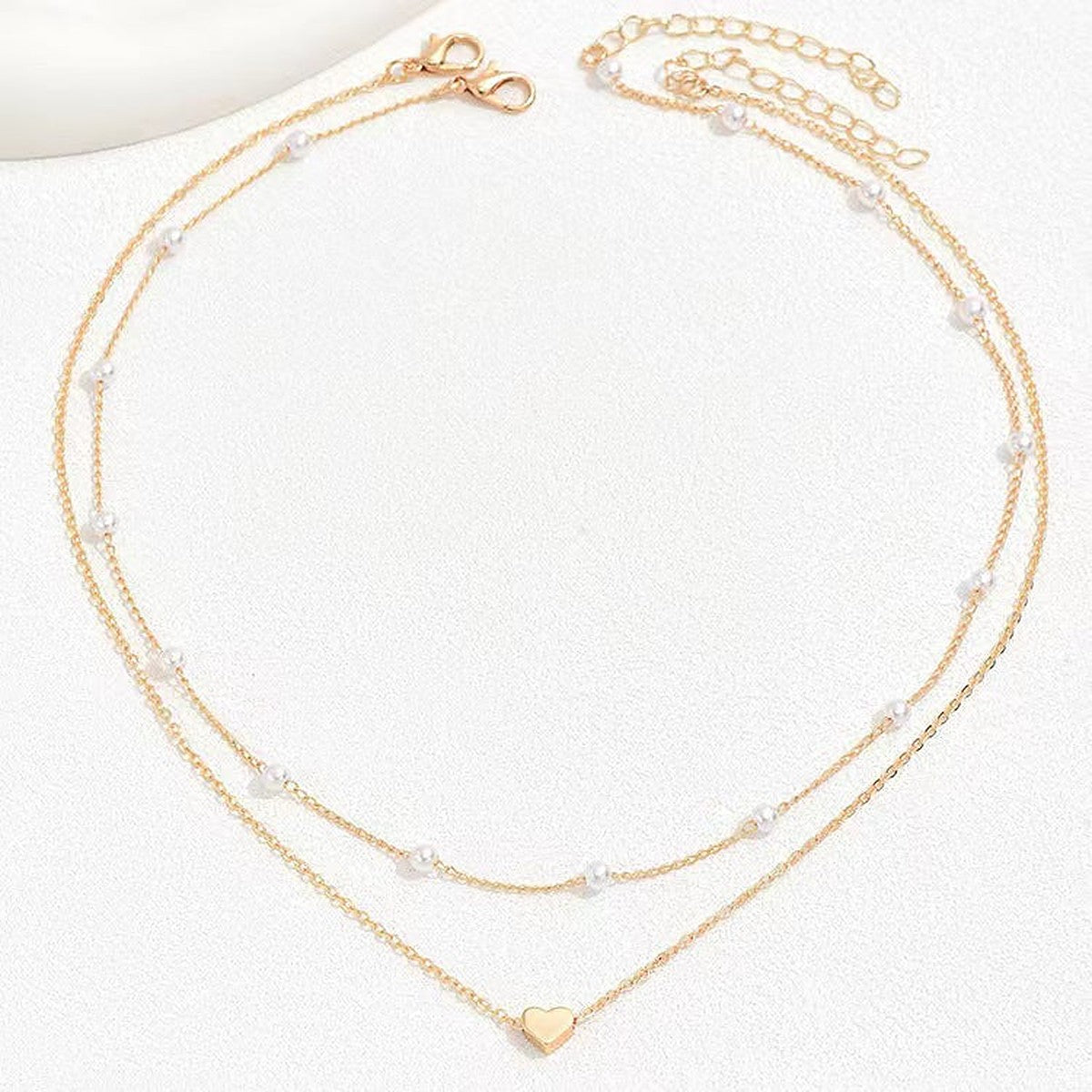 Collar Doble de Perlas con Corazón – Dorado